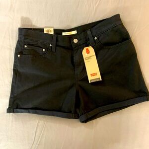 Women’s Black Levi’s shorts.